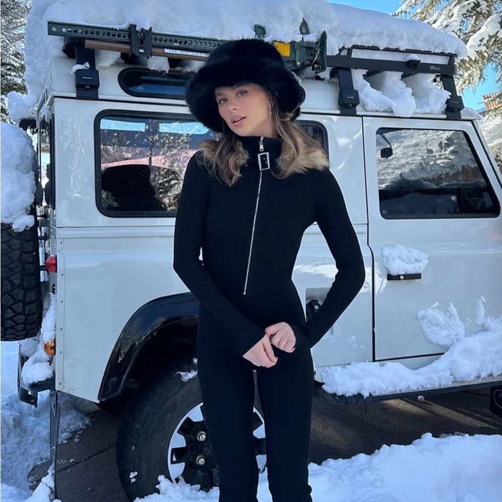 12th Tribe Apres Faux Fur Trimmed Black Ribbed Knit Jumpsuit